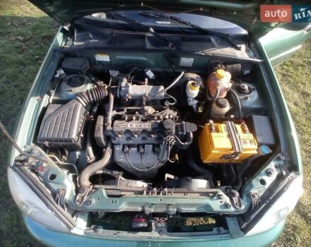 Зеленый Дэу Ланос, объемом двигателя 1.5 л и пробегом 211 тыс. км за 2400 $, фото 4 на Automoto.ua