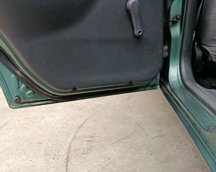 Зеленый Дэу Ланос, объемом двигателя 1.5 л и пробегом 241 тыс. км за 3000 $, фото 2 на Automoto.ua