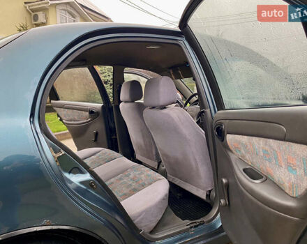 Зеленый Дэу Ланос, объемом двигателя 1.5 л и пробегом 230 тыс. км за 2400 $, фото 10 на Automoto.ua