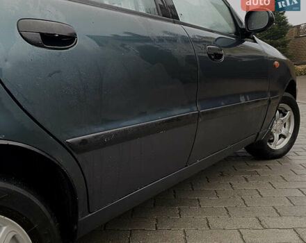 Зеленый Дэу Ланос, объемом двигателя 1.5 л и пробегом 230 тыс. км за 2400 $, фото 3 на Automoto.ua