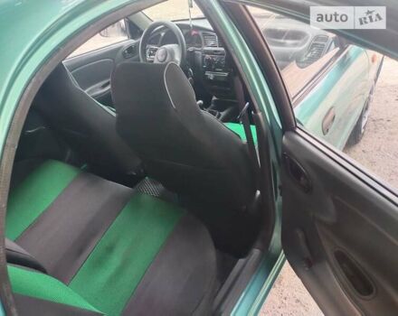 Зеленый Дэу Ланос, объемом двигателя 1.5 л и пробегом 299 тыс. км за 3000 $, фото 10 на Automoto.ua