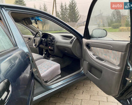 Зеленый Дэу Ланос, объемом двигателя 1.5 л и пробегом 230 тыс. км за 2400 $, фото 6 на Automoto.ua