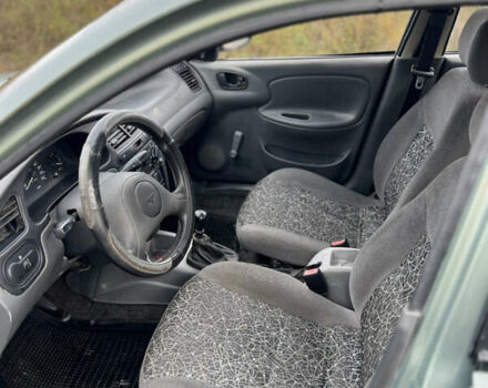 Зеленый Дэу Ланос, объемом двигателя 1.5 л и пробегом 220 тыс. км за 1850 $, фото 7 на Automoto.ua