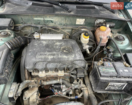 Зеленый Дэу Ланос, объемом двигателя 1.39 л и пробегом 110 тыс. км за 1550 $, фото 12 на Automoto.ua