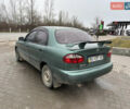Зеленый Дэу Ланос, объемом двигателя 1.39 л и пробегом 110 тыс. км за 1550 $, фото 2 на Automoto.ua