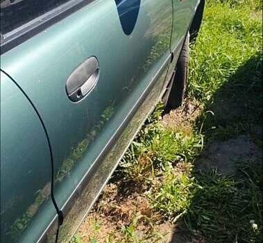 Зеленый Дэу Ланос, объемом двигателя 1.6 л и пробегом 137 тыс. км за 1500 $, фото 2 на Automoto.ua