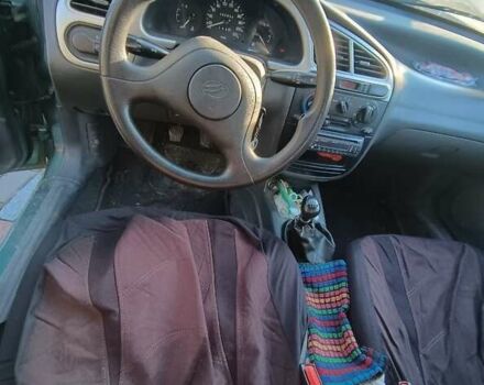 Дэу Ланос 2009 в Житомире на Automoto.ua Зеленый Дэу Ланос, объемом двигателя 1.35 л и пробегом 91 тыс. км за 2200 $, фото 7 на Automoto.ua