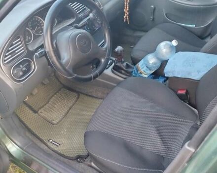 Зелений Деу Ланос, об'ємом двигуна 1.5 л та пробігом 180 тис. км за 2600 $, фото 11 на Automoto.ua