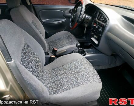 Зеленый Дэу Ланос, объемом двигателя 1.5 л и пробегом 151 тыс. км за 2900 $, фото 12 на Automoto.ua