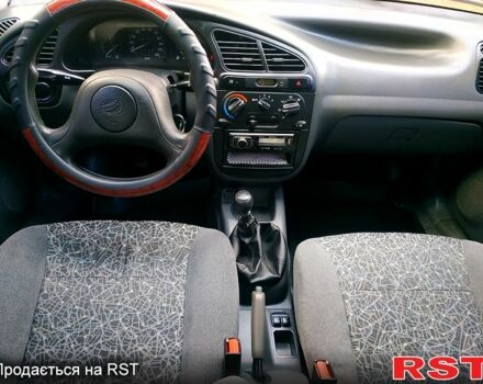 Зеленый Дэу Ланос, объемом двигателя 1.5 л и пробегом 151 тыс. км за 2900 $, фото 10 на Automoto.ua