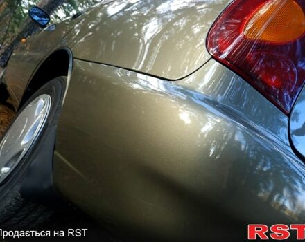 Зеленый Дэу Ланос, объемом двигателя 1.5 л и пробегом 151 тыс. км за 2900 $, фото 6 на Automoto.ua