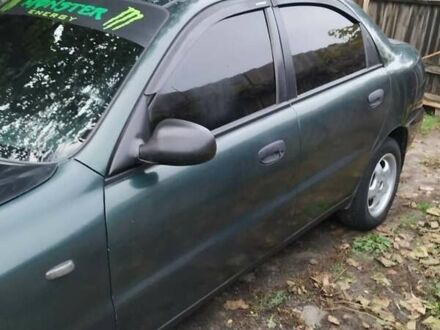 Деу Ланос 2003 у Люботине на Automoto.ua Зелений Деу Ланос, об'ємом двигуна 1.5 л та пробігом 200 тис. км за 2000 $, фото 1 на Automoto.ua
