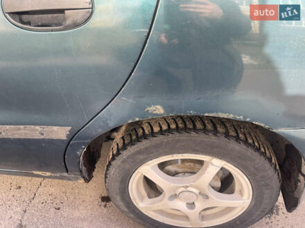 Дэу Ланос 2005 в Днепре (Днепропетровске) на Automoto.ua Зеленый Дэу Ланос, объемом двигателя 1.35 л и пробегом 163 тыс. км за 1800 $, фото 1 на Automoto.ua