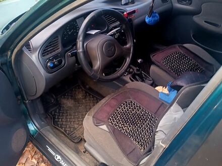 Дэу Ланос 2007 в Славянске на Automoto.ua Зеленый Дэу Ланос, объемом двигателя 1.5 л и пробегом 230 тыс. км за 1400 $, фото 1 на Automoto.ua