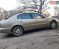 Бежевий Деу Леганза, об'ємом двигуна 2 л та пробігом 148 тис. км за 3000 $, фото 10 на Automoto.ua
