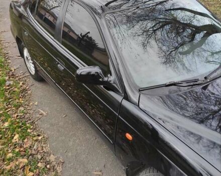 Черный Дэу Леганза, объемом двигателя 2 л и пробегом 250 тыс. км за 2100 $, фото 2 на Automoto.ua