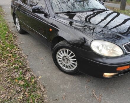 Черный Дэу Леганза, объемом двигателя 2 л и пробегом 235 тыс. км за 2100 $, фото 1 на Automoto.ua