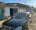 Черный Дэу Леганза, объемом двигателя 2 л и пробегом 300 тыс. км за 1650 $, фото 1 на Automoto.ua