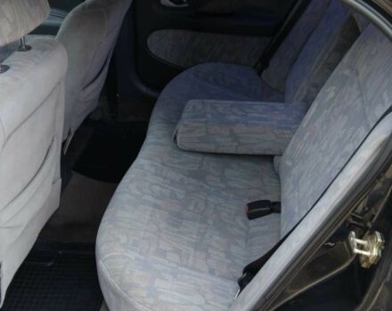 Черный Дэу Леганза, объемом двигателя 2.2 л и пробегом 200 тыс. км за 2000 $, фото 6 на Automoto.ua