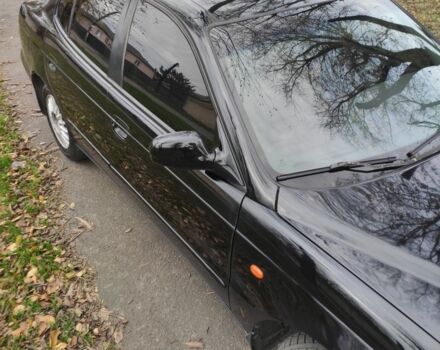 Черный Дэу Леганза, объемом двигателя 2 л и пробегом 235 тыс. км за 2100 $, фото 2 на Automoto.ua