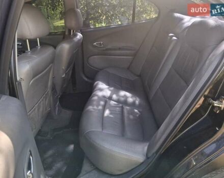 Черный Дэу Леганза, объемом двигателя 2 л и пробегом 225 тыс. км за 1700 $, фото 1 на Automoto.ua