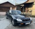 Черный Дэу Леганза, объемом двигателя 2 л и пробегом 280 тыс. км за 2300 $, фото 1 на Automoto.ua