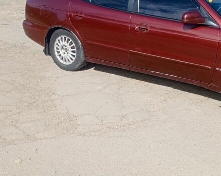 Коричневый Дэу Леганза, объемом двигателя 2 л и пробегом 270 тыс. км за 1500 $, фото 4 на Automoto.ua