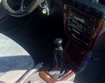 Коричневый Дэу Леганза, объемом двигателя 2 л и пробегом 270 тыс. км за 1500 $, фото 1 на Automoto.ua