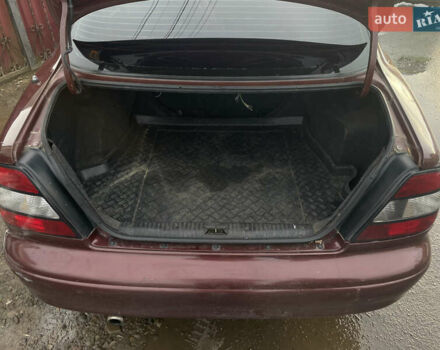 Коричневый Дэу Леганза, объемом двигателя 2 л и пробегом 250 тыс. км за 1400 $, фото 6 на Automoto.ua