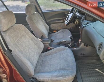 Червоний Деу Леганза, об'ємом двигуна 2 л та пробігом 362 тис. км за 1250 $, фото 11 на Automoto.ua