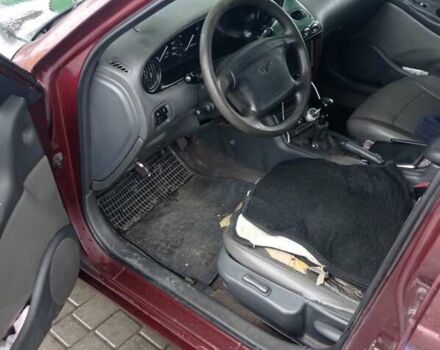 Красный Дэу Леганза, объемом двигателя 2 л и пробегом 450 тыс. км за 1185 $, фото 5 на Automoto.ua