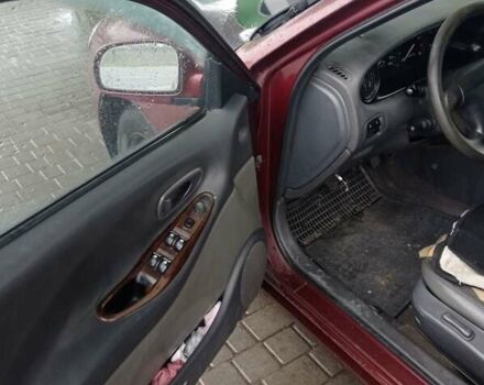 Красный Дэу Леганза, объемом двигателя 2 л и пробегом 450 тыс. км за 1185 $, фото 7 на Automoto.ua