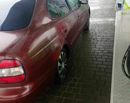 Красный Дэу Леганза, объемом двигателя 2 л и пробегом 450 тыс. км за 1187 $, фото 5 на Automoto.ua