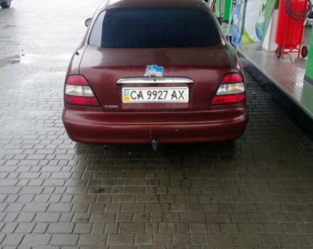 Красный Дэу Леганза, объемом двигателя 2 л и пробегом 450 тыс. км за 1185 $, фото 2 на Automoto.ua