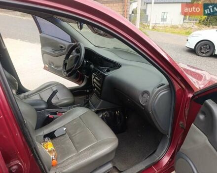 Червоний Деу Леганза, об'ємом двигуна 2 л та пробігом 285 тис. км за 1999 $, фото 4 на Automoto.ua