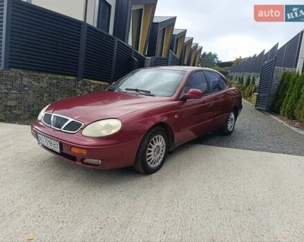 Червоний Деу Леганза, об'ємом двигуна 2 л та пробігом 285 тис. км за 1999 $, фото 2 на Automoto.ua
