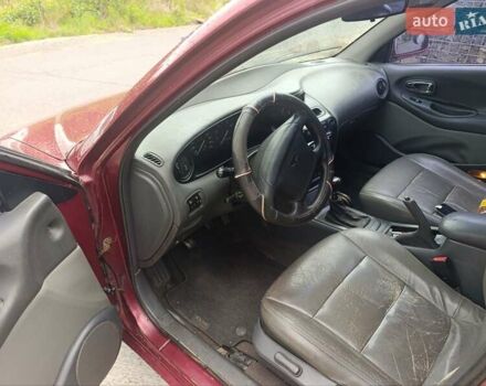 Червоний Деу Леганза, об'ємом двигуна 2 л та пробігом 285 тис. км за 1999 $, фото 5 на Automoto.ua