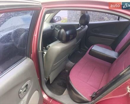 Червоний Деу Леганза, об'ємом двигуна 2 л та пробігом 285 тис. км за 1750 $, фото 1 на Automoto.ua