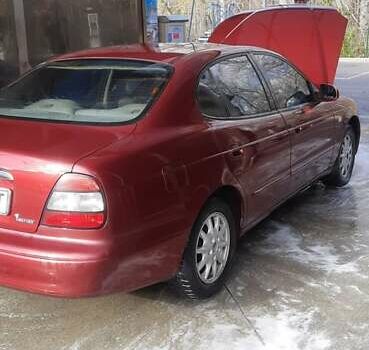 Красный Дэу Леганза, объемом двигателя 2 л и пробегом 253 тыс. км за 2800 $, фото 3 на Automoto.ua