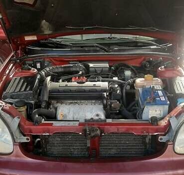 Красный Дэу Леганза, объемом двигателя 2 л и пробегом 253 тыс. км за 2800 $, фото 6 на Automoto.ua