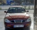 Красный Дэу Леганза, объемом двигателя 2 л и пробегом 253 тыс. км за 2800 $, фото 1 на Automoto.ua