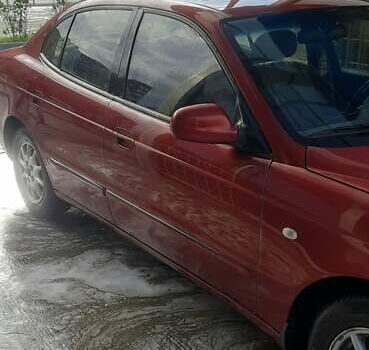 Красный Дэу Леганза, объемом двигателя 2 л и пробегом 253 тыс. км за 2800 $, фото 2 на Automoto.ua