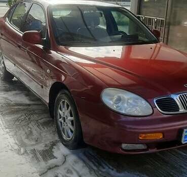 Красный Дэу Леганза, объемом двигателя 2 л и пробегом 253 тыс. км за 2800 $, фото 1 на Automoto.ua