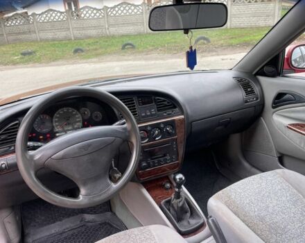 Красный Дэу Леганза, объемом двигателя 2 л и пробегом 185 тыс. км за 2450 $, фото 6 на Automoto.ua