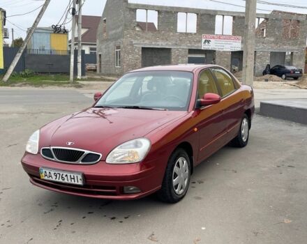 Красный Дэу Леганза, объемом двигателя 2 л и пробегом 185 тыс. км за 2450 $, фото 1 на Automoto.ua
