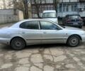 Сірий Деу Леганза, об'ємом двигуна 2 л та пробігом 133 тис. км за 900 $, фото 1 на Automoto.ua