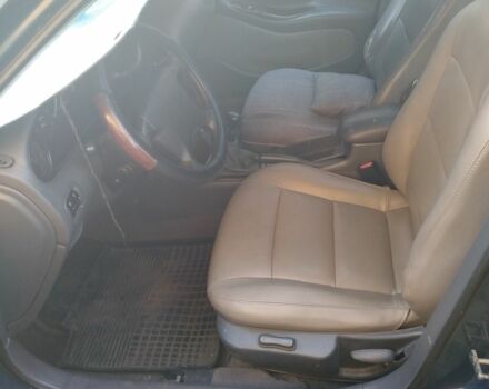 Синий Дэу Леганза, объемом двигателя 2 л и пробегом 300 тыс. км за 1200 $, фото 4 на Automoto.ua