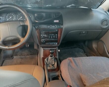 Синий Дэу Леганза, объемом двигателя 2 л и пробегом 300 тыс. км за 1200 $, фото 5 на Automoto.ua