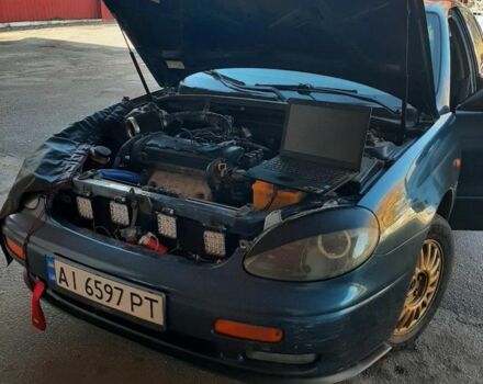 Синий Дэу Леганза, объемом двигателя 2 л и пробегом 200 тыс. км за 2000 $, фото 1 на Automoto.ua