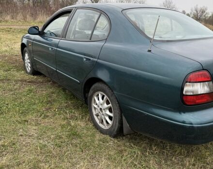 Зеленый Дэу Леганза, объемом двигателя 2 л и пробегом 230 тыс. км за 1500 $, фото 1 на Automoto.ua